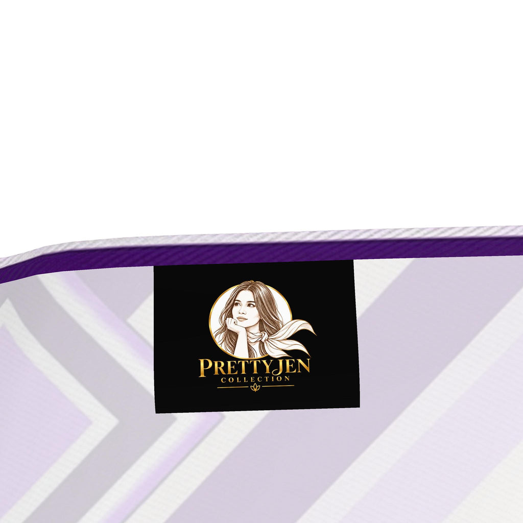 Close-up of a mattress corner showing a purple and white patterned surface with a black brand label reading Prettyjen Collection.
